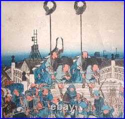Japanese Woodblock print by Utagawa Hiroshige, titled Nihonbashi Morning Scene