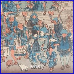 Japanese Woodblock print by Utagawa Hiroshige, titled Nihonbashi Morning Scene