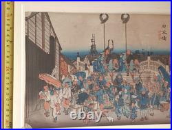 Japanese Woodblock print by Utagawa Hiroshige, titled Nihonbashi Morning Scene
