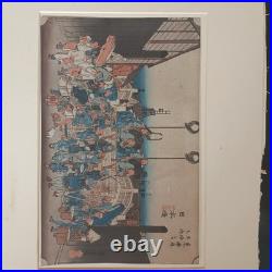 Japanese Woodblock print by Utagawa Hiroshige, titled Nihonbashi Morning Scene
