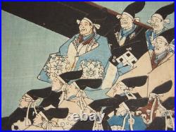 Kuniyoshi Woodblock Print Triptych Yoritomo Throws Dices for his Retainers Kuniyoshi Woodblock Print Triptych Yoritomo Throws Dices for his Retainers